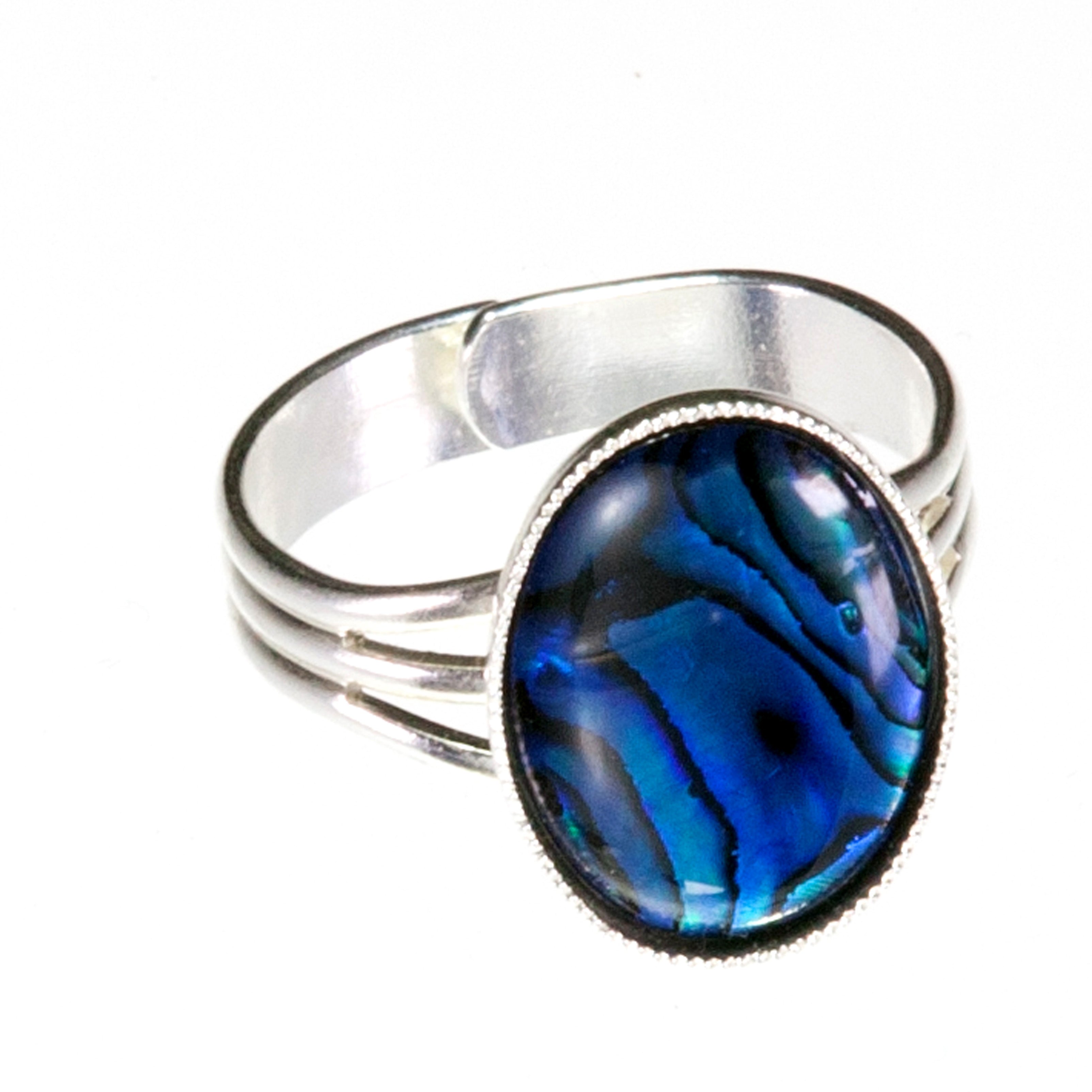 Adjustable dress ring will compliment any outfit. Suitable for medium to large fingers the 18mm x 13mm Blue Abalone Shell cabochon makes a statement without being over powering.  Abalone is believed to strengthen the immune system and increase stamina.     It is thought to enhance the four C's  Communication  Cooperation  Commitment  Compromise     leading to harmony and balance.     The Abalone shell has been tossed and turned in the ocean for many years and through this process, its true beauty
