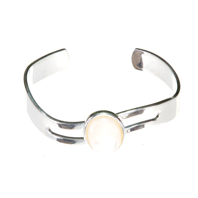 Adjustable wave bangle  Bracelet Cuff, Flattering on the Wrist with a Cream Mother of Pearl Oval Cabochon.